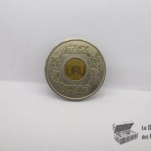 Ficha de máquina expendedora Coca-Cola (Uruguay)